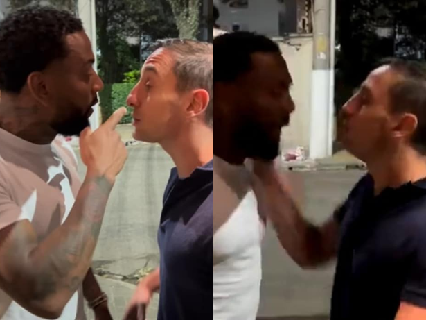 Dois homens estão em pé um ao lado do outro brigando.