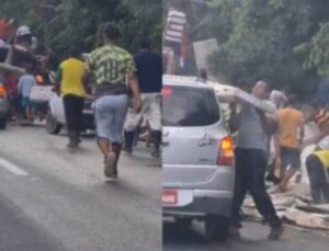 Carreta com móveis tomba e população saqueia carga; Veja vídeo!