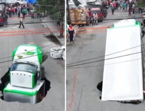Caminhão de refrigerantes afunda em cratera gigante no meio da rua; veja VÍDEO