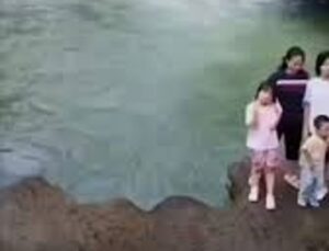 Menina cai em rio durante foto e situação quase acaba em tragédia; VEJA VÍDEO!