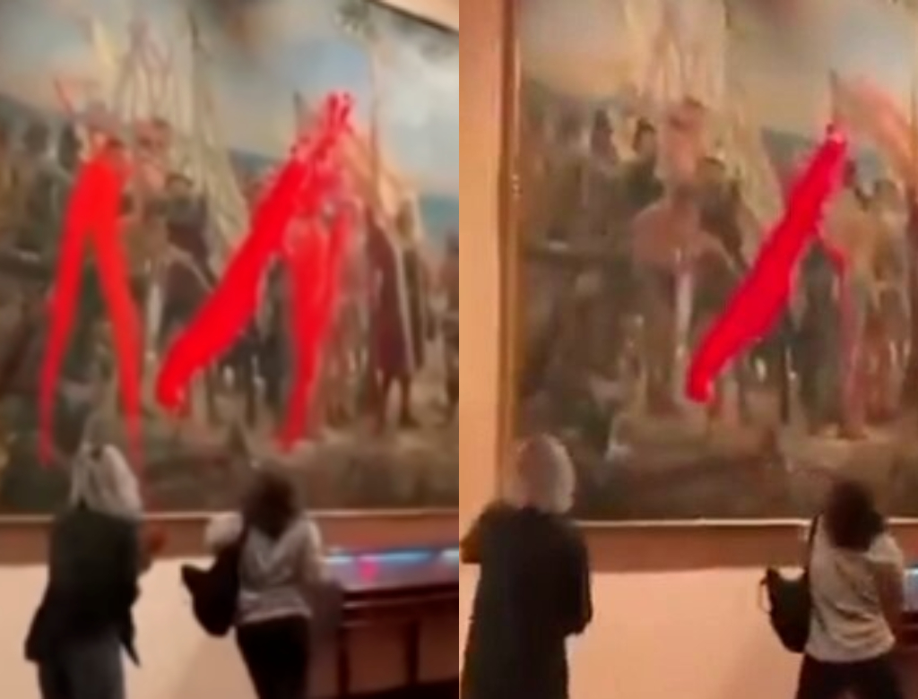 Ativistas jogam tinta em quadro (Foto: Reprodução)