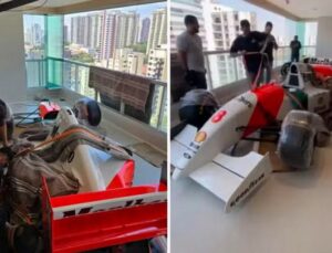 Réplica da McLaren de Ayrton Senna é içada para apartamento; veja vídeo